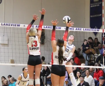 JFK drops district semi to Clippers